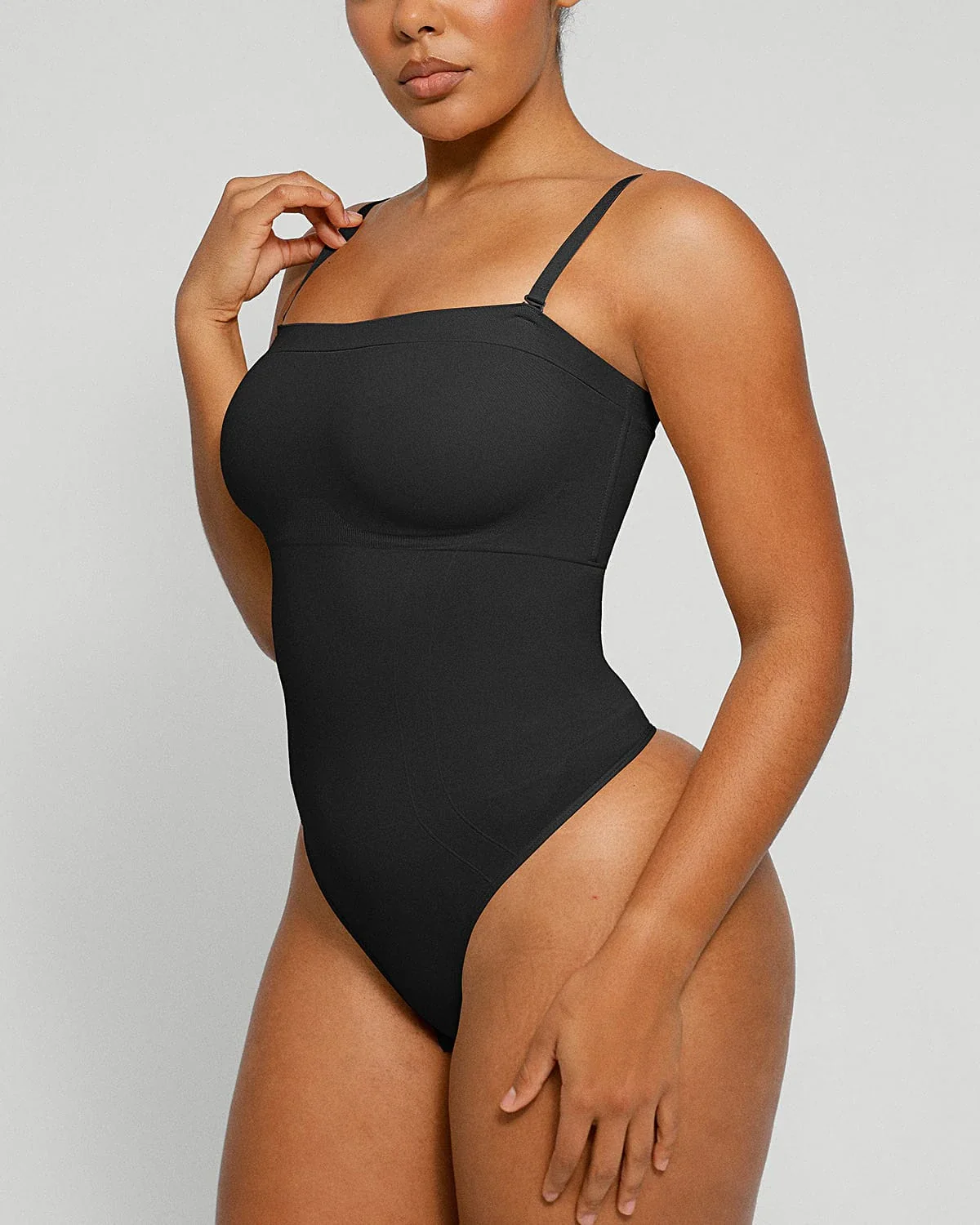 Bare Essentials™ Skin Flow Strapless Sculpt Thong Bodysuit - Image 10