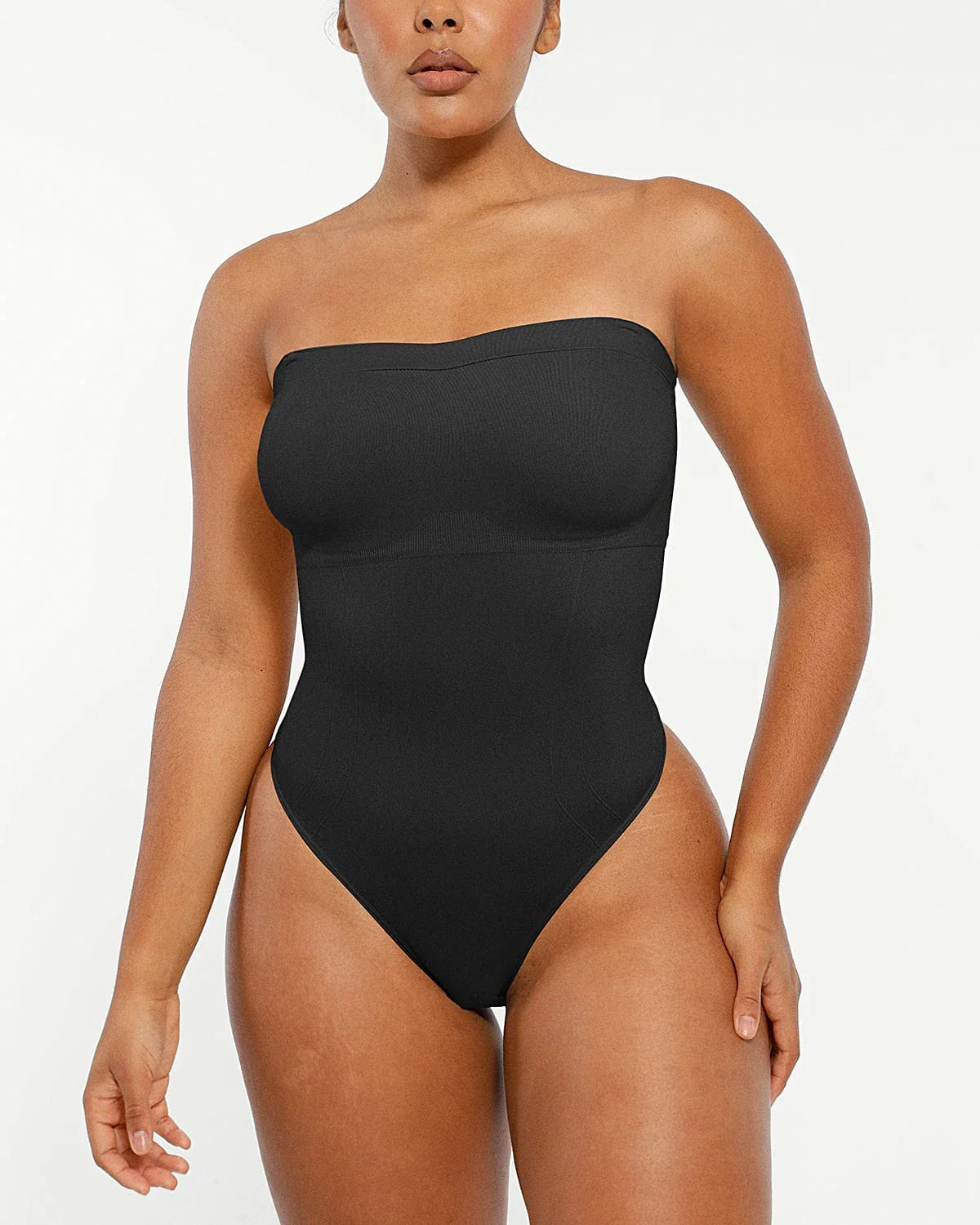 Bare Essentials™ Skin Flow Strapless Sculpt Thong Bodysuit - Image 9